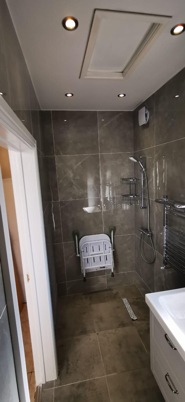 Walk-in shower installation by United 2 Plumb in Greenford