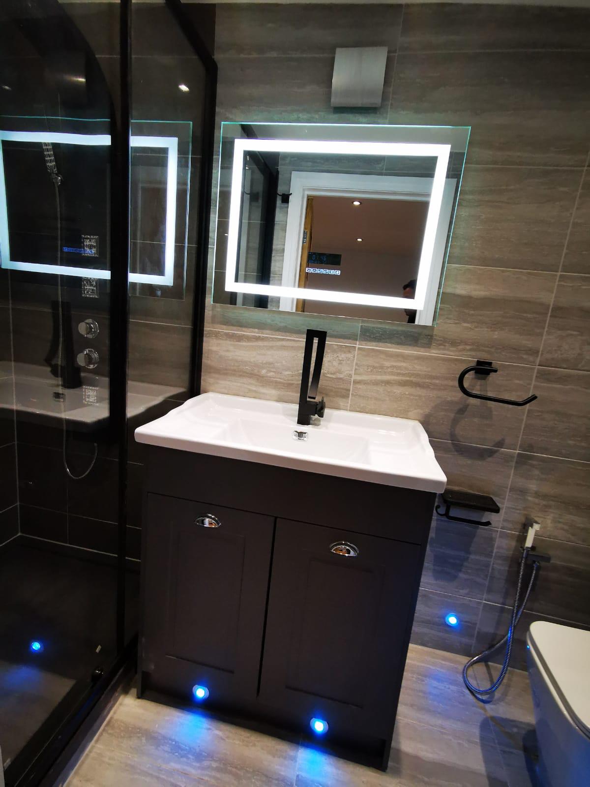 LED vanity bathroom installation by United 2 Plumb in Ealing